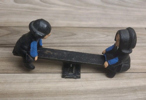Vintage cast iron amish boy - cast,