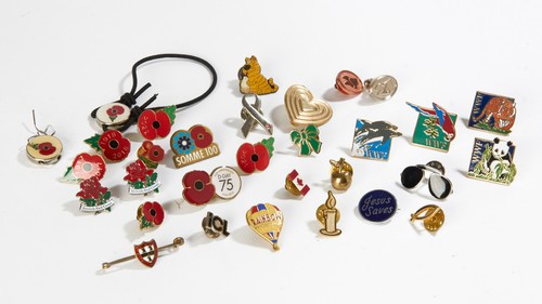 Assorted enamel badges - assorted,