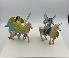 SCHLEICH Bayala Fairy Surah & Glitter Pegasus Blossom & Eyela on golden unicorn