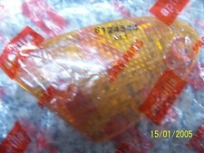 Aprilia SR 125-150 Leonardo genuine indicator lens OE. LH 8124544