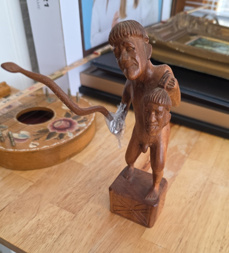 Vintage tribal head hunter - head,