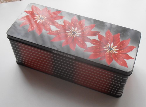 Poinsettas tin parkinsons - tin.,