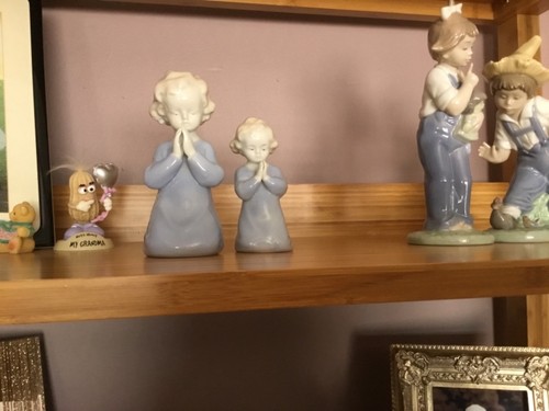 Little praying figures by - 2,