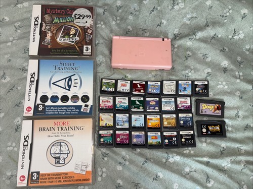 Pink nintendo lite with 30 - ds,