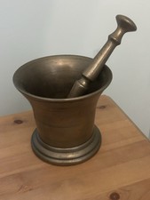 Antique brass pestle and - pestle,