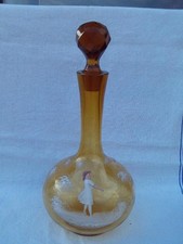 ANTIQUE HAND BLOWN AMBER GLASS DECANTER WITH WHITE ENAMEL DECORATION . M3571