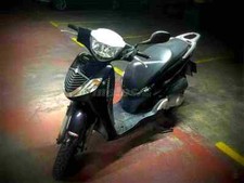 Honda SH150i 2006 3 A4 Photo