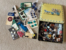 Box of various buttons in Huntley & Palmers biscuit tin