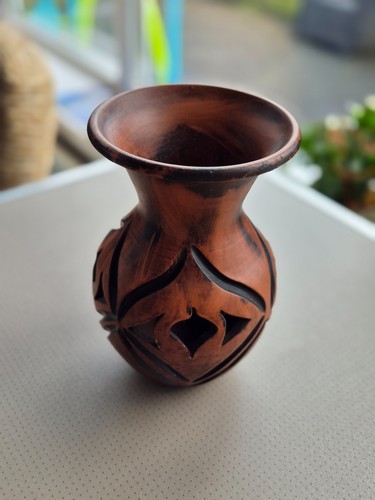 Small terracotta glazed vase