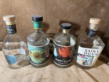 4 EMPTY RUM BOTTLES MIXTURE