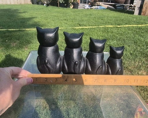 Vintage cast iron black four - ,