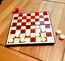 Travelling Magnetic Draughts/