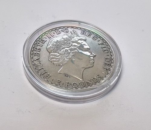 Two pounds silver - two,