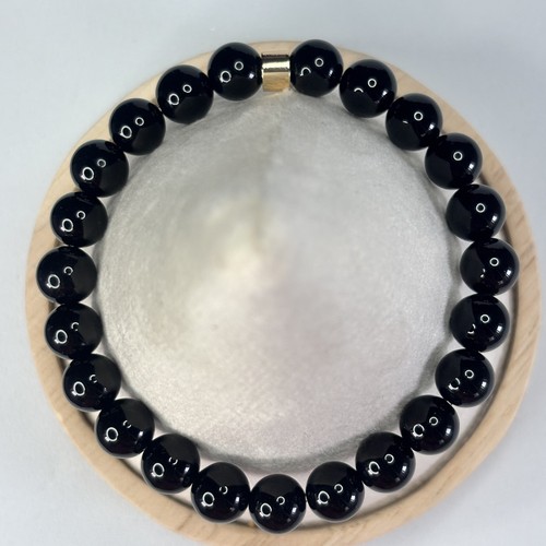 Black onyx crystal gemstone - black,