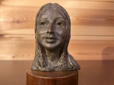 Bronzed Spelter Bust of a Young Woman on Wooden Base