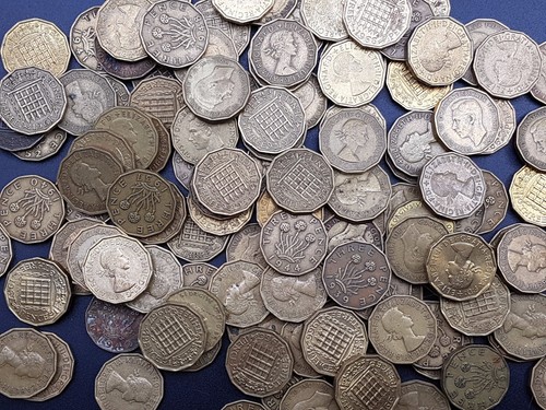 Three penny coin thrupenny - three,
