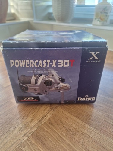 Daiwa powercast 30t reel - x,