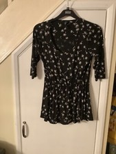 Next black with white pattern