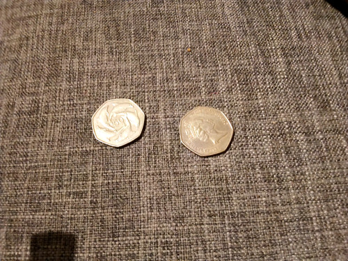 Pence coin with dolphins - coin,