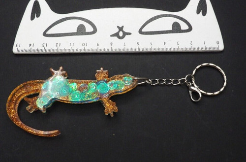 Green copper lizard key - &,