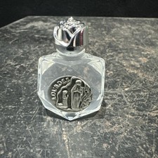 Small glass bottle containing - bottle,