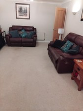 Two Leather two seater recliner settees. In great condition.