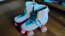 Story Pink Suede Roller Skates