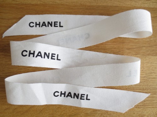 Chanel white embossed designer - chanel,