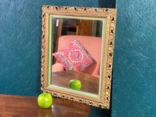 A CHARMING ANTIQUE DECORATIVE GILT FRAMED GESSO WALL MIRROR