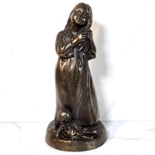 Heredities Bronze Figurine