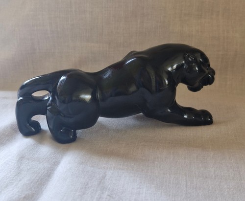 Black obsidian jaguar crystal - black,