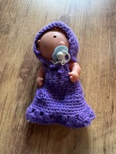 thumb sucking baby doll with dummy