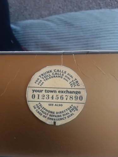 Bakelite phone dial - bakelite,