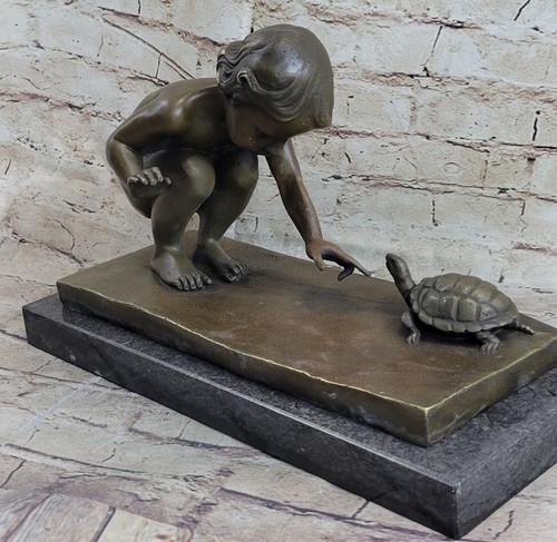 Bronze girl playing - girl, sea
