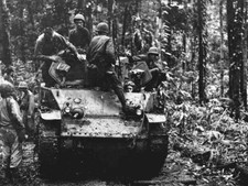 Tank moves in on Cape Gloucester 1943 WW11 World War 2 Photograph