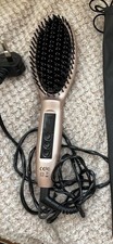 Rose Gold Asvea Straightening Hair Brush With Different Temp Settings