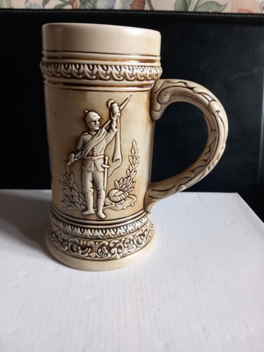 Tankard with two old - a,