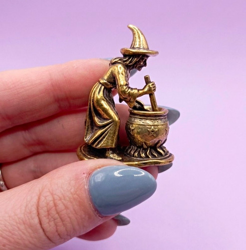 Brass metal witch stirring - witch,