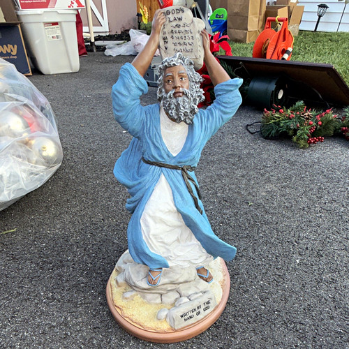 Moses holding ten commandments - holding,