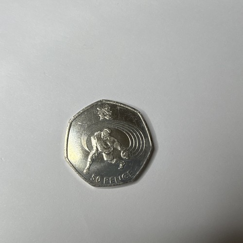 2011 goalball olympic coin - goalball,