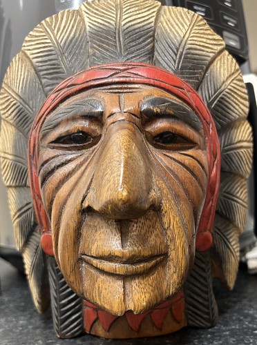 Native style hand - carved, wood