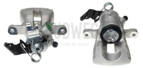 Behind the rear left brake - behind, /