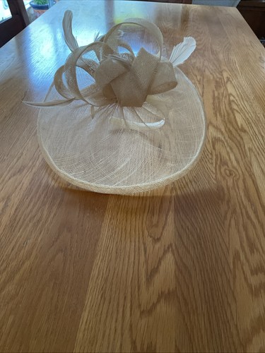 Cream fascinator from - fascinator,