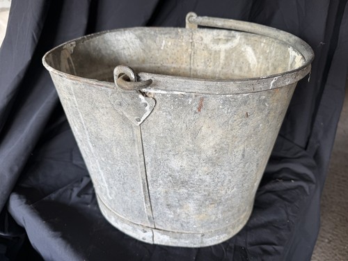 Old galvanized metal mop - galvanized,