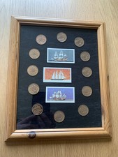 Collection of 12 Halfpenny coins  Mounted In a Frame