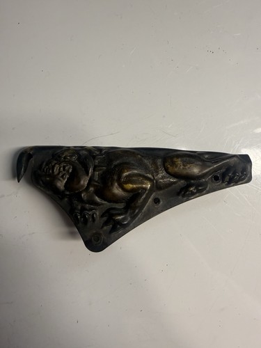 Cairns fire helmet carved - cairns,