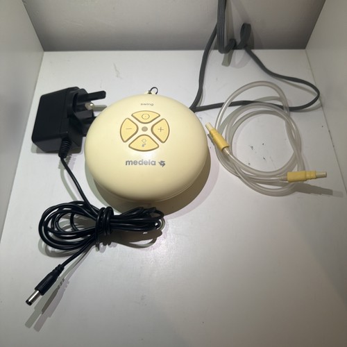 Medela swing pump and adaptor - pump,