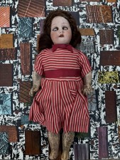 Small vintage bisque doll