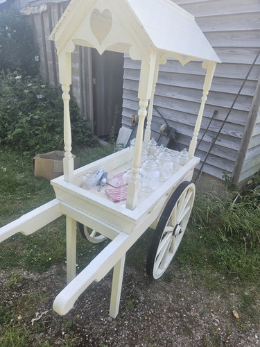 Cream wooden wheeled wedding - wooden,