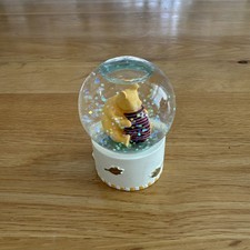 Disney Winnie The Pooh Mini Snow Globe. 6.5cm tall. Honey Pot Autumn Leaves Pink